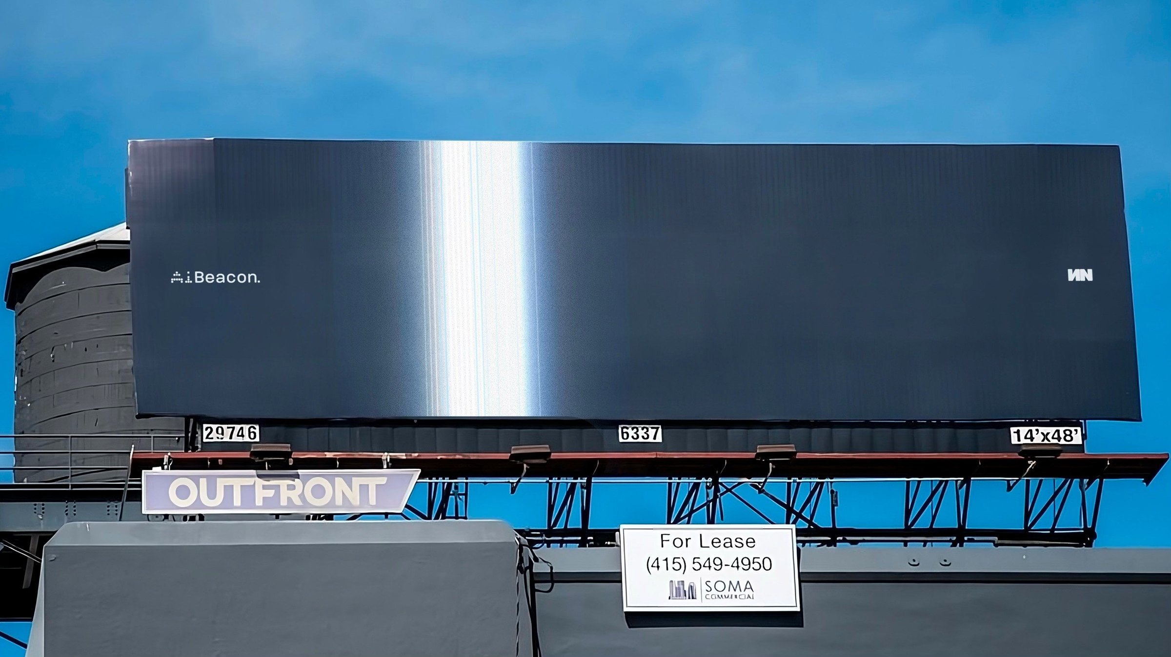 Slide from the NN pitch deck: an AiBeacon billboard rendered on a highway sign against a blue sky